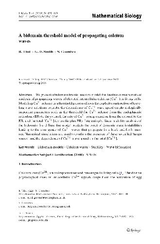 A bidomain threshold model of propagating calcium waves