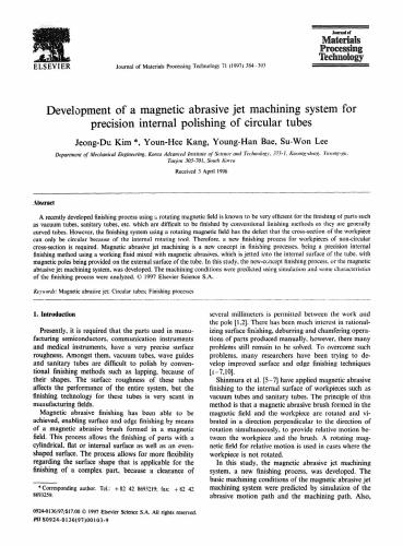 Development of a magnetic abrasive jet machining system for precision internal polishing of circular tubes