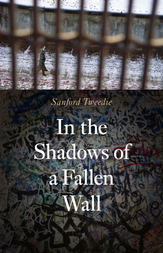 In the shadows of a fallen wall
